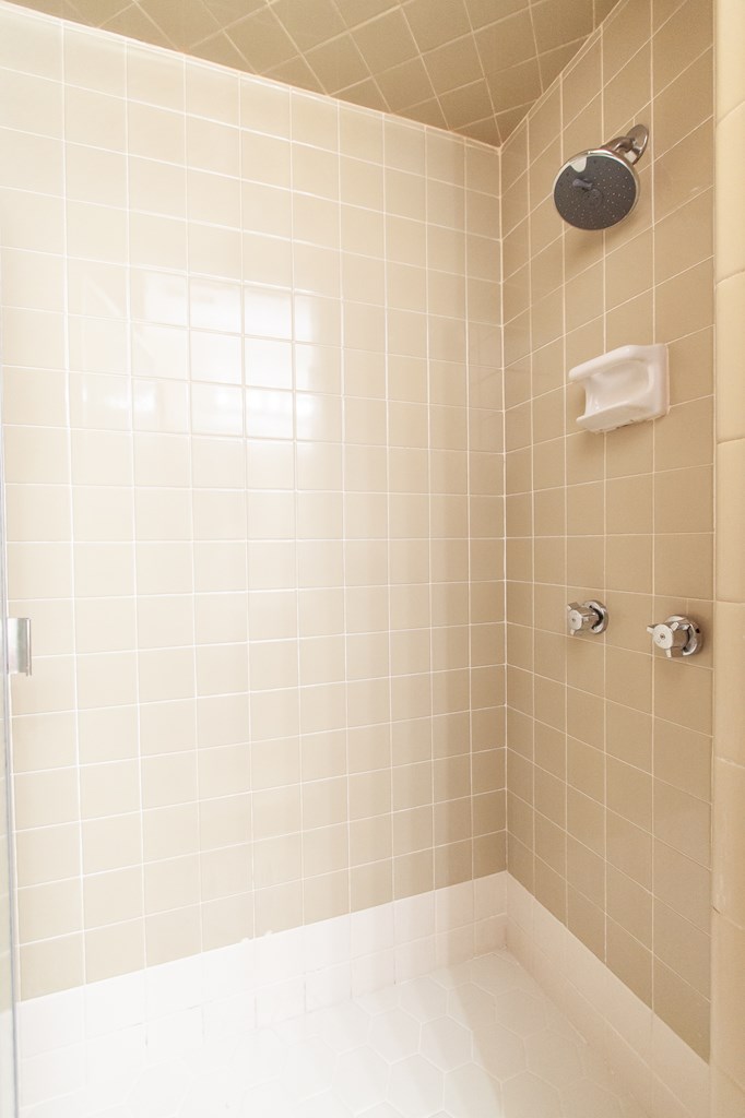 4315 Macon Road Columbus, GA 31907 - Photo 16 of 37 a bathroom with a shower