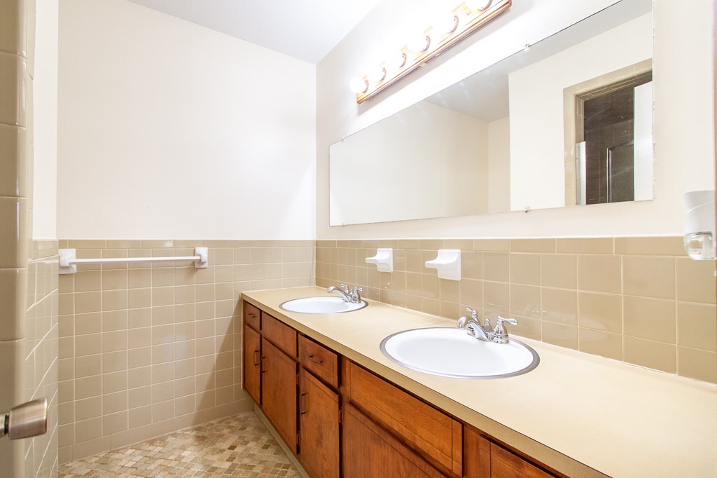 4315 Macon Road Columbus, GA 31907 - Photo 20 of 37 a bathroom with a sink and a mirror