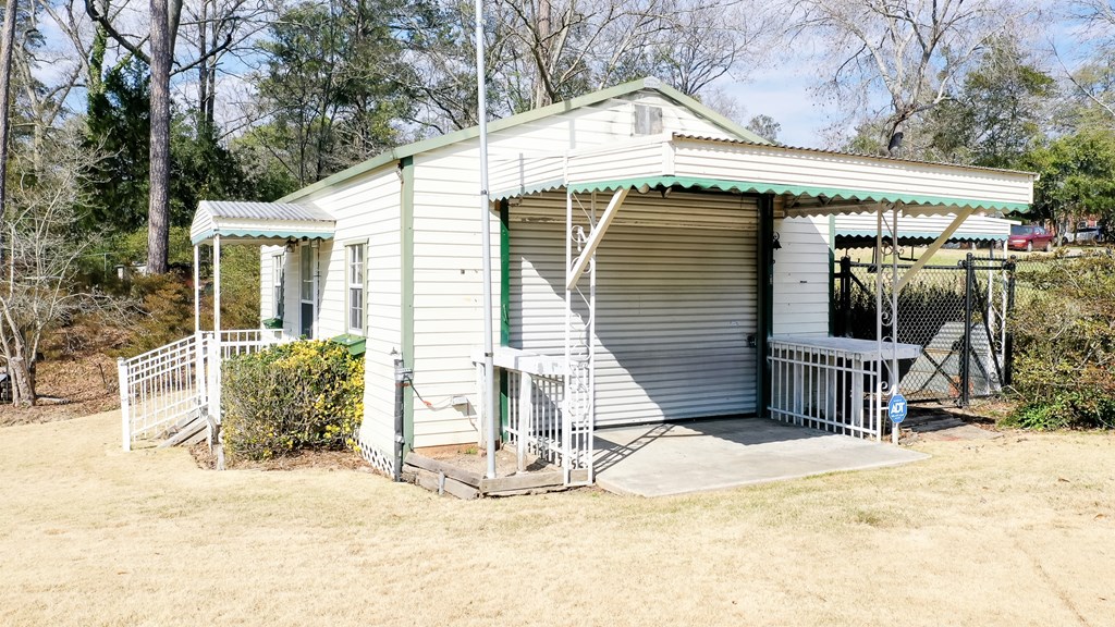 4315 Macon Road Columbus, GA 31907 - Photo 23 of 37 a view of a house with a patio