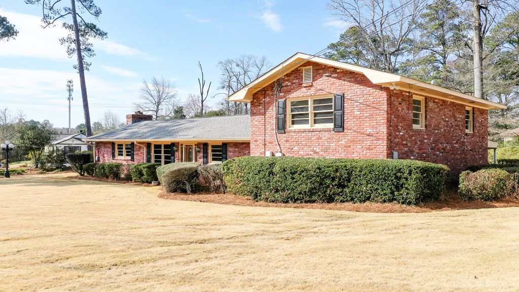 4315 Macon Road Columbus, GA 31907 - Photo 37 of 37 a front view of a house with a yard