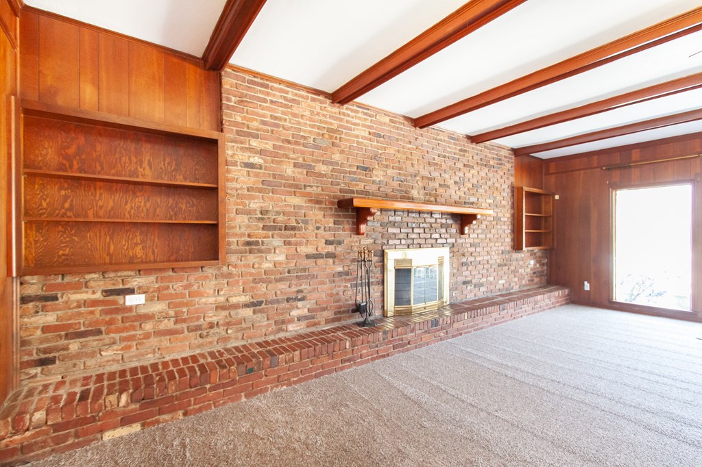 4315 Macon Road Columbus, GA 31907 - Photo 5 of 37 a front view of a house with a yard