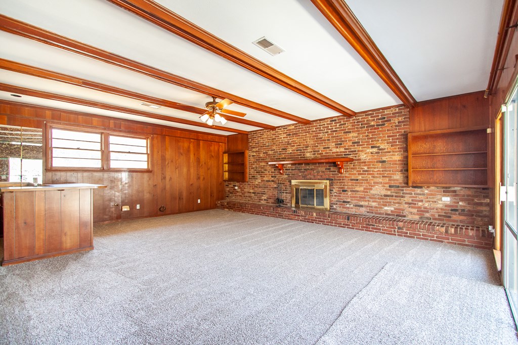 4315 Macon Road Columbus, GA 31907 - Photo 6 of 37 a view of a room with wooden walls