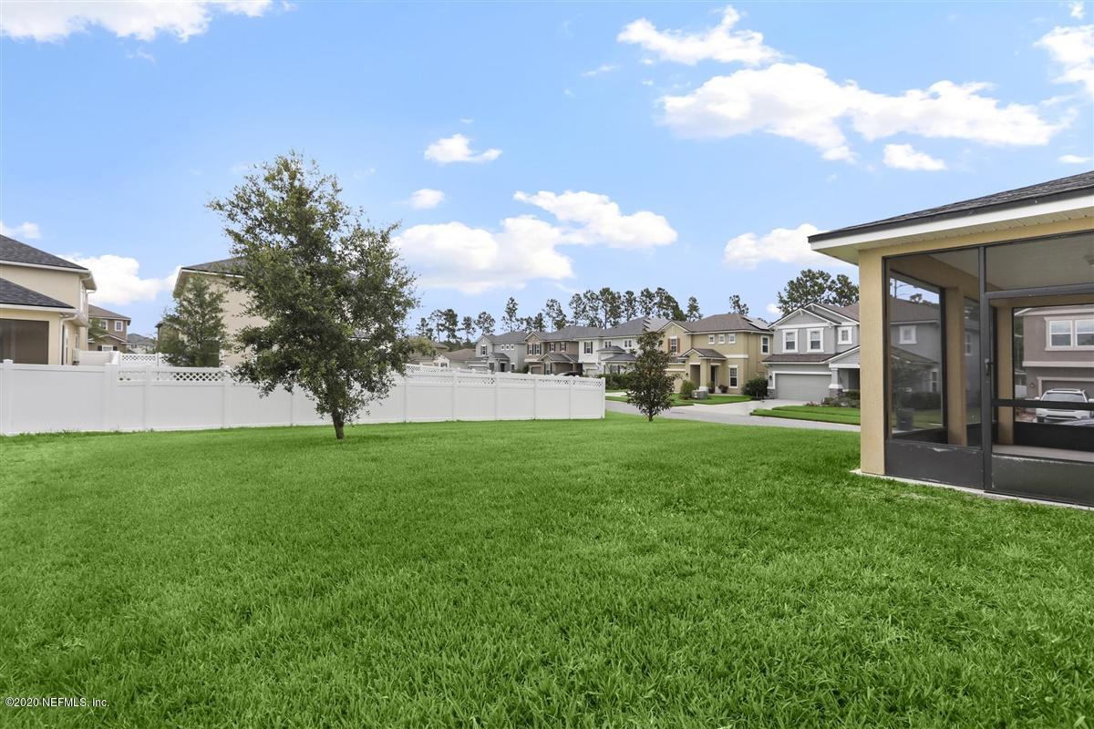 6775 Azalea Park Road Jacksonville, FL 32259 - Photo 19 of 22 a view of a backyard