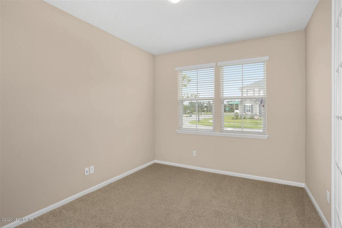 6775 Azalea Park Road Jacksonville, FL 32259 - Photo 3 of 22 an empty room with a window