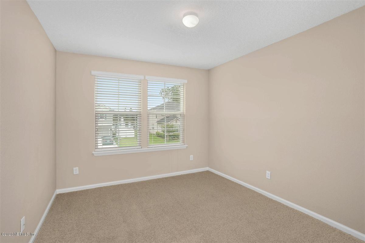6775 Azalea Park Road Jacksonville, FL 32259 - Photo 10 of 22 an empty room with a window