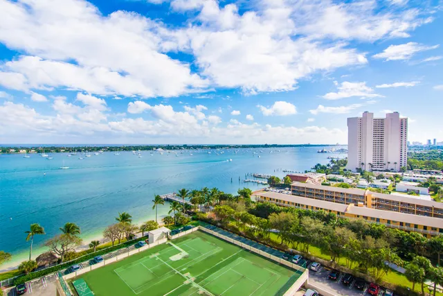 a view of a lake with a city