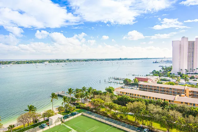 a view of a lake with a city