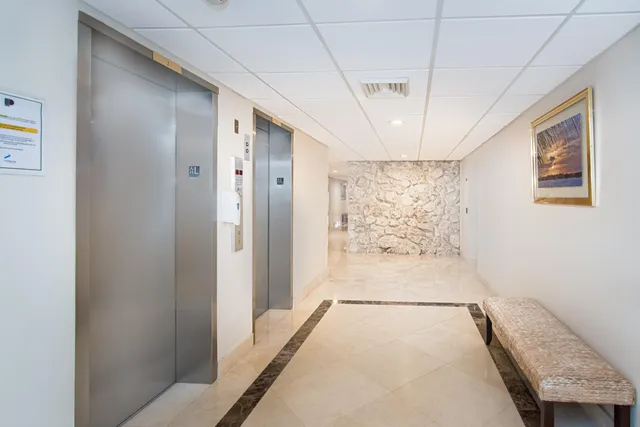 a view of hallway with a large window