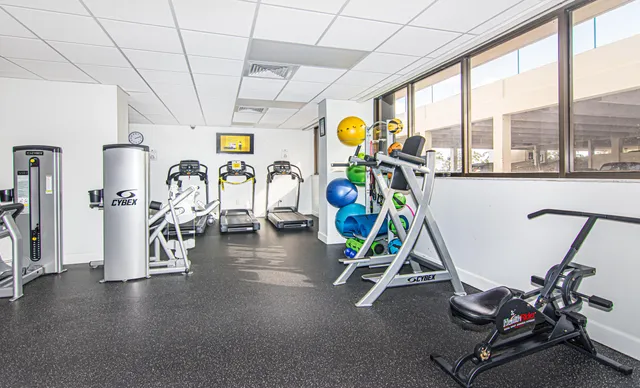 a view of a room with gym equipment