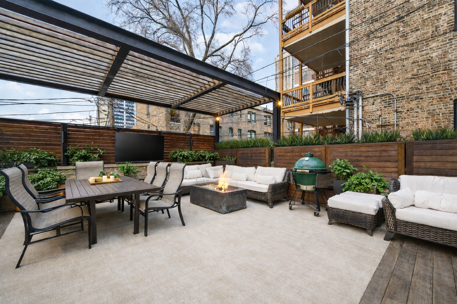 458 West Deming Place Chicago, IL 60614 - Photo 16 of 34 a view of a patio with couches table and chairs and potted plants