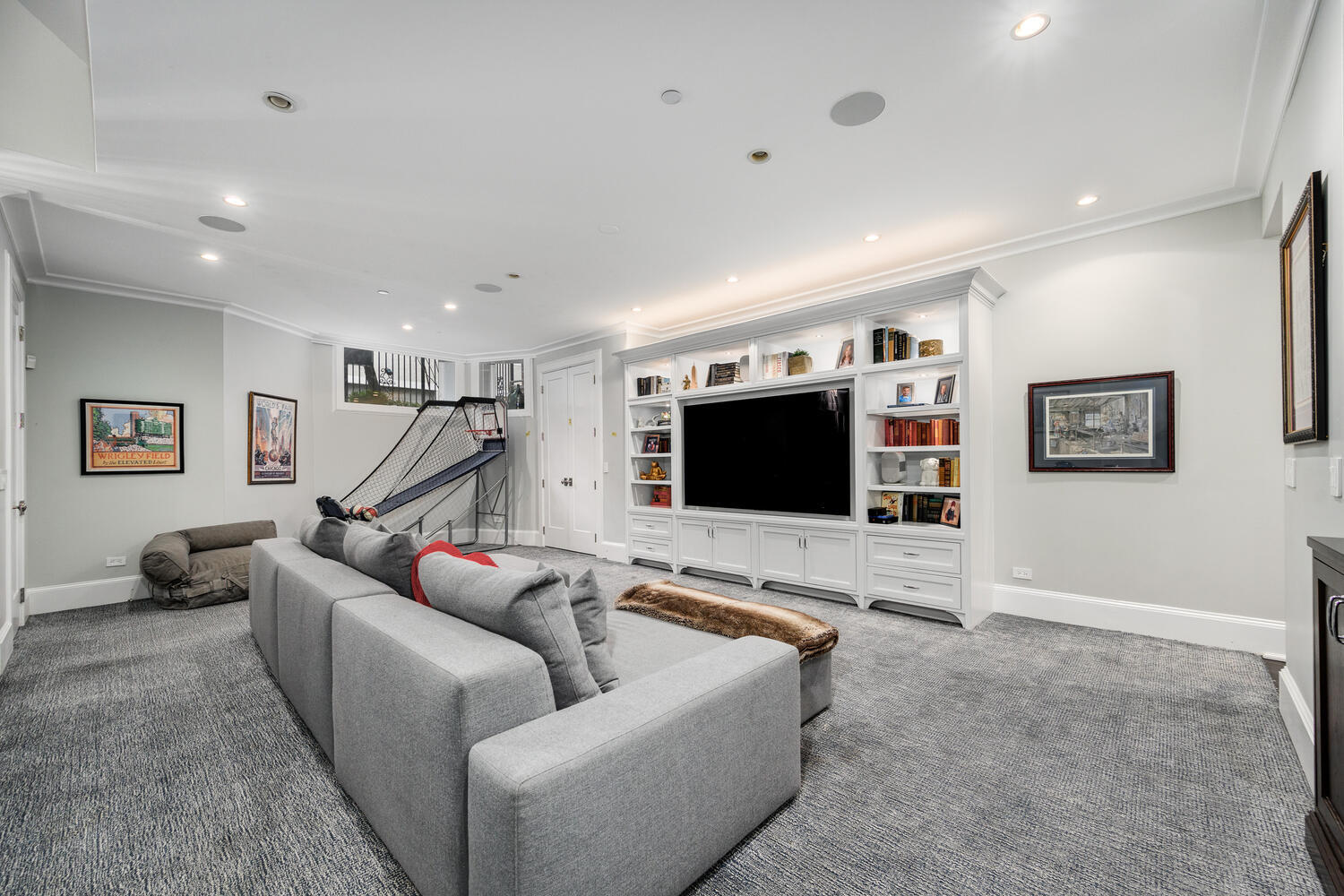 458 West Deming Place Chicago, IL 60614 - Photo 28 of 34 a living room with furniture and a flat screen tv