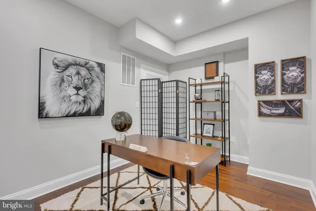a view of a livingroom with furniture and window