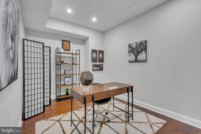 a workspace with furniture and lamp