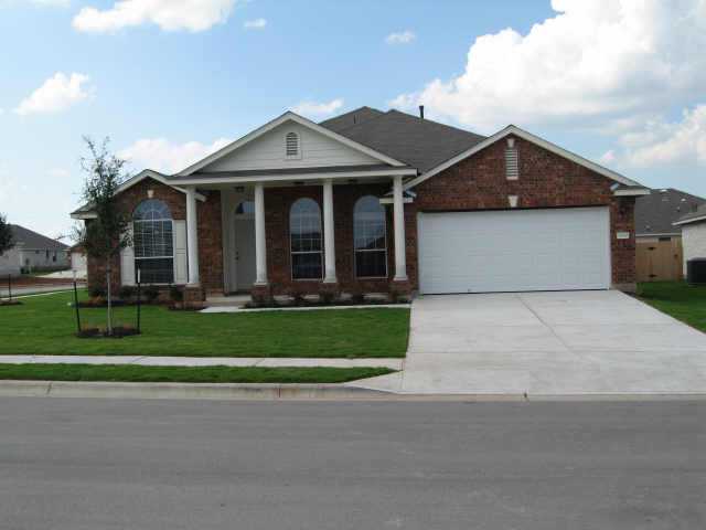 2500 Butler Way Round Rock, TX 78665 - Photo 1 of 1 a front view of a house with a garden