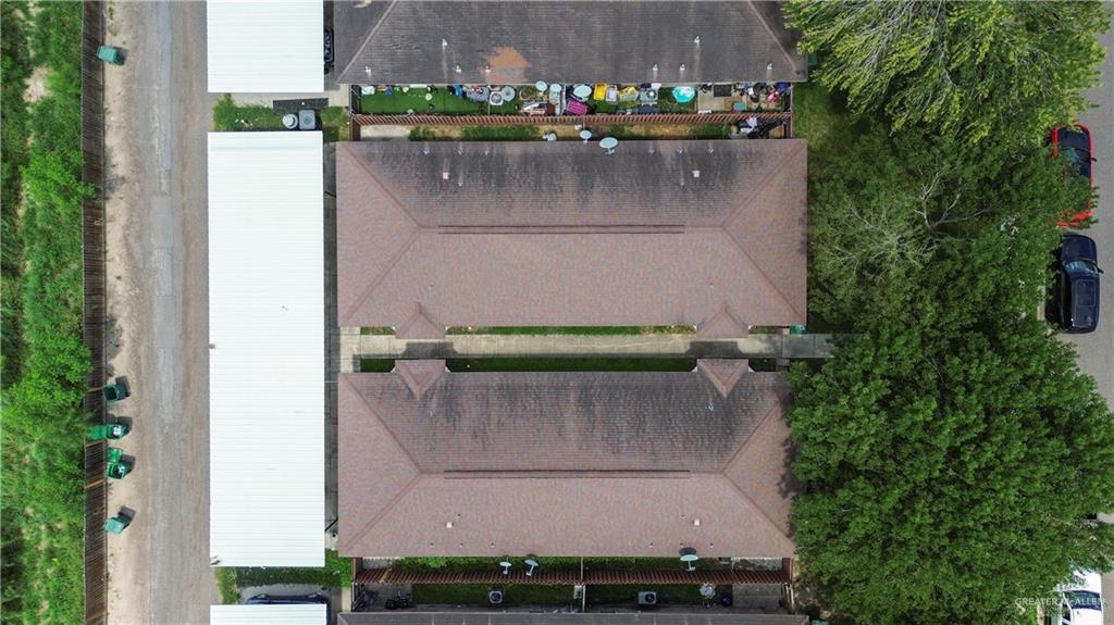 2205 North Erica Street Pharr, TX 78577 - Photo 18 of 21 an aerial view of a house with a yard and a large tree