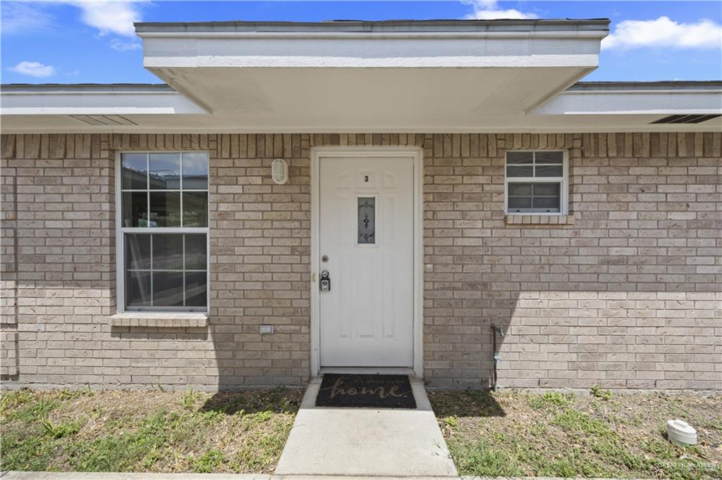 2205 North Erica Street Pharr, TX 78577 - Photo 2 of 21 a front view of a house with a shower