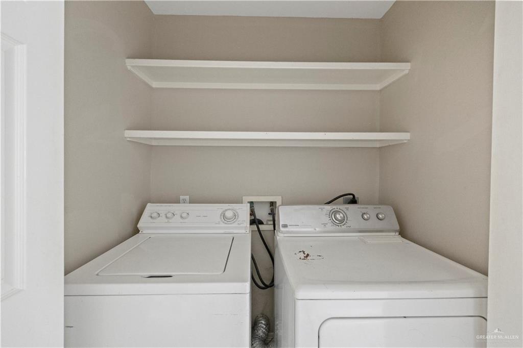 2205 North Erica Street Pharr, TX 78577 - Photo 8 of 21 a utility room with dryer and washer