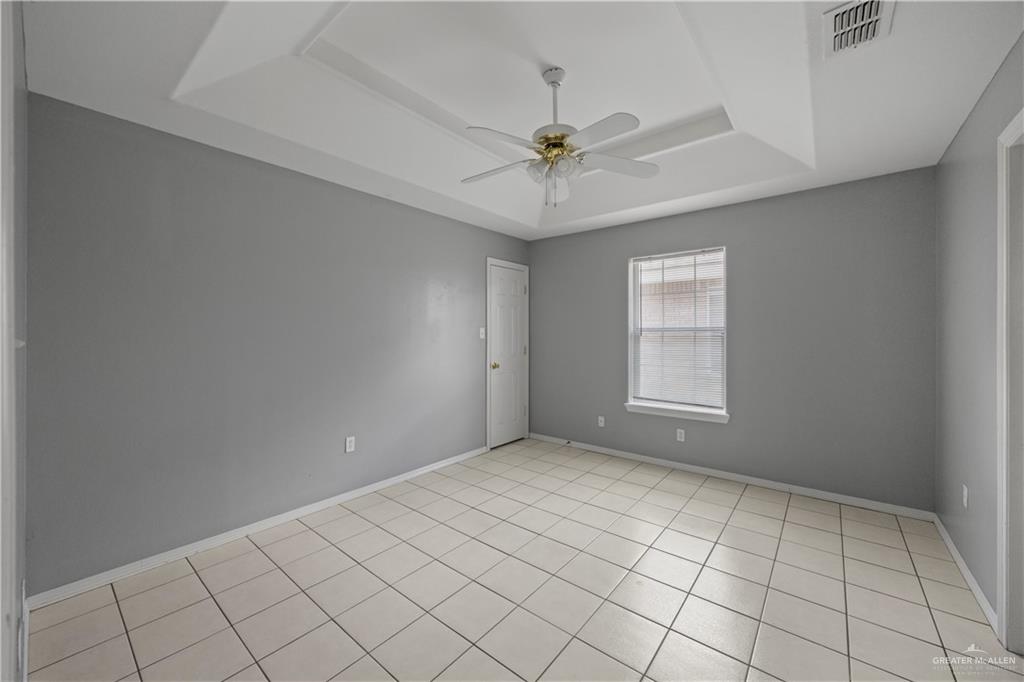 2205 North Erica Street Pharr, TX 78577 - Photo 9 of 21 a view of an empty room with a window