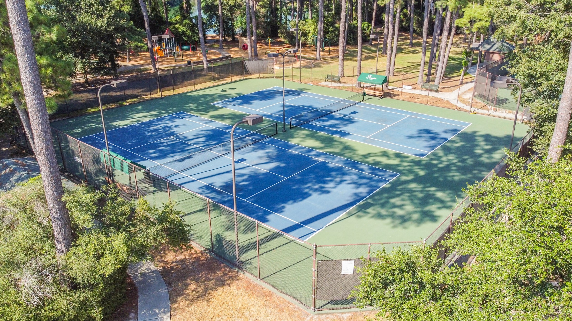 9535 Empress Crossing Drive Spring, TX 77379 - Photo 34 of 45 Tennis courts are one of the many amenities offered in Gleannloch Farms