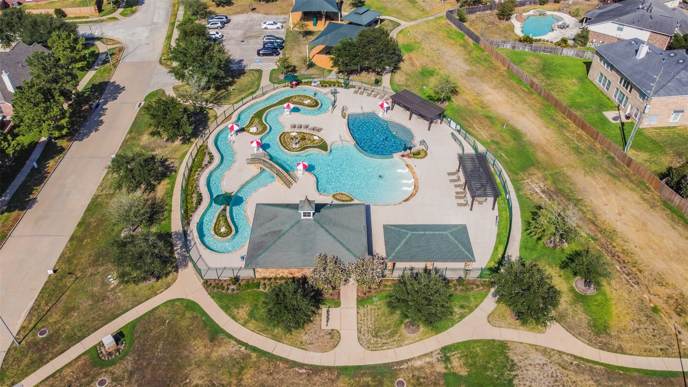 9535 Empress Crossing Drive Spring, TX 77379 - Photo 35 of 45 Community Lazy River Pool and Bluff Playground