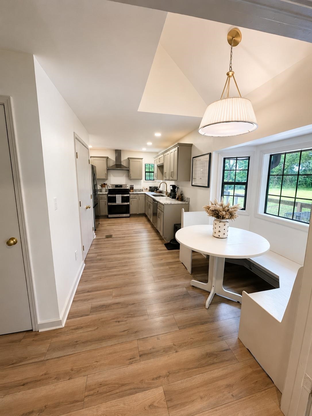 470 Rich Road Somerville, TN 38068 - Photo 20 of 40 Kitchen featuring wood-finish flooring, recessed lighting, and a built-in banquette with window seating