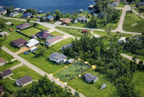 an aerial view of a play ground with lots of green space