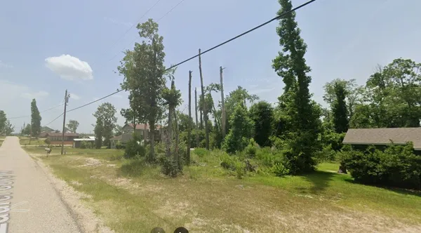 a view of a water fountain in the yard