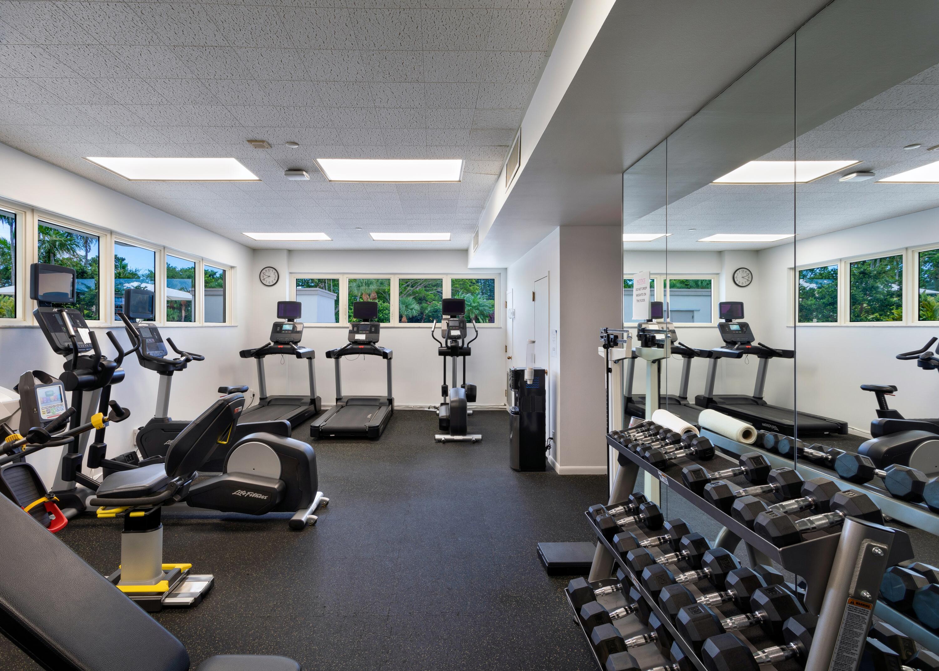 901 East Camino Real, Unit 7C Boca Raton, FL 33432 - Photo 37 of 41 a room with gym equipment and a large window