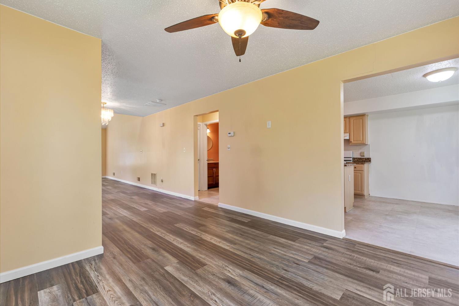 146 Nebula Road Piscataway, NJ 08854 - Photo 13 of 51 a view of a livingroom with wooden floor