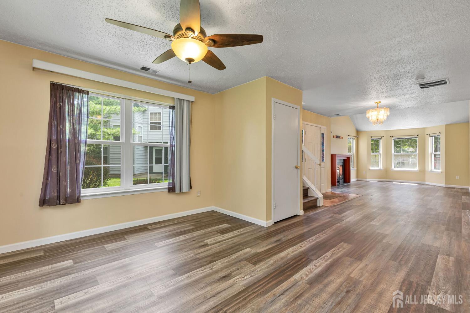 146 Nebula Road Piscataway, NJ 08854 - Photo 14 of 51 a view of livingroom with hardwood floor and ceiling fan