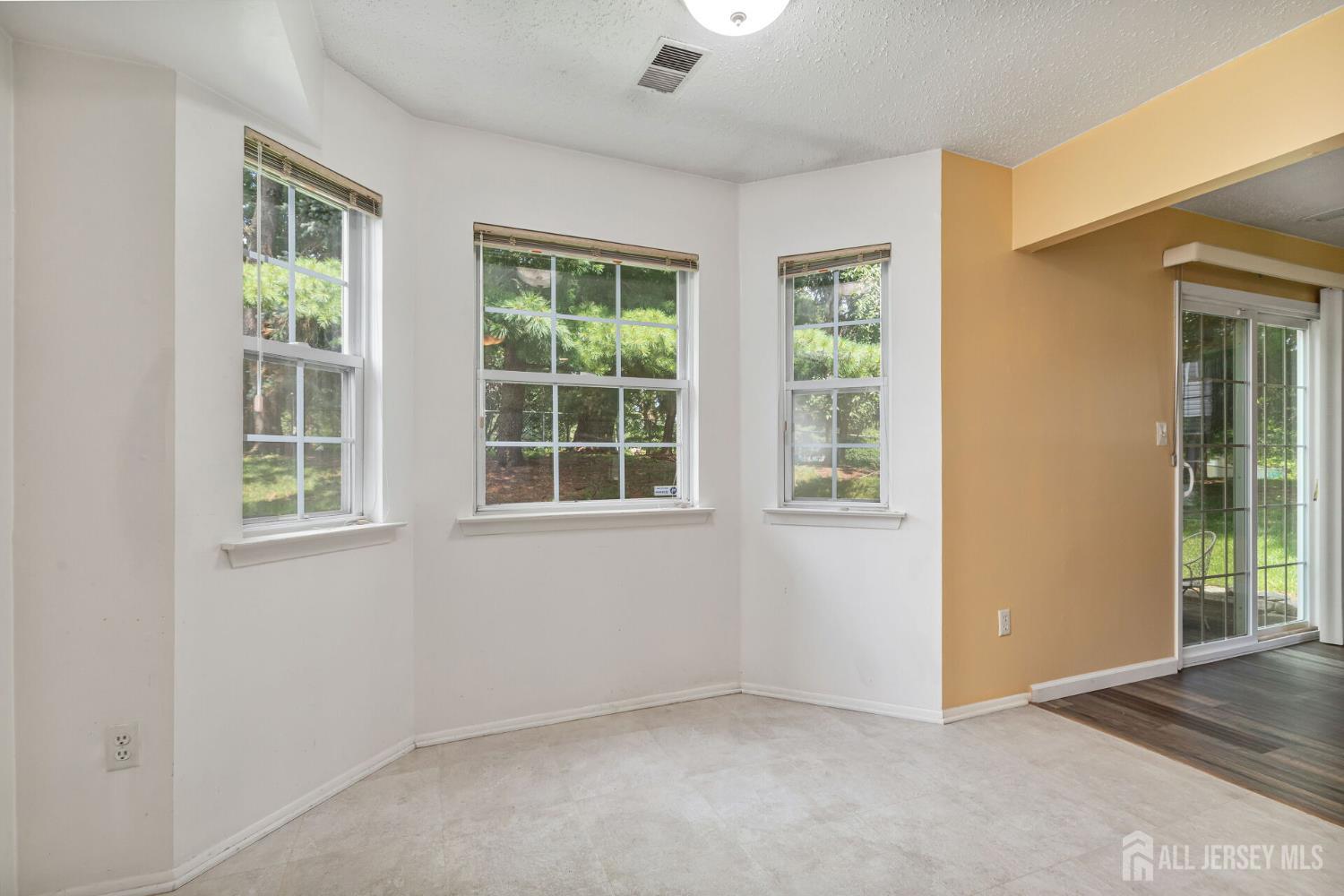 146 Nebula Road Piscataway, NJ 08854 - Photo 17 of 51 an empty room with windows