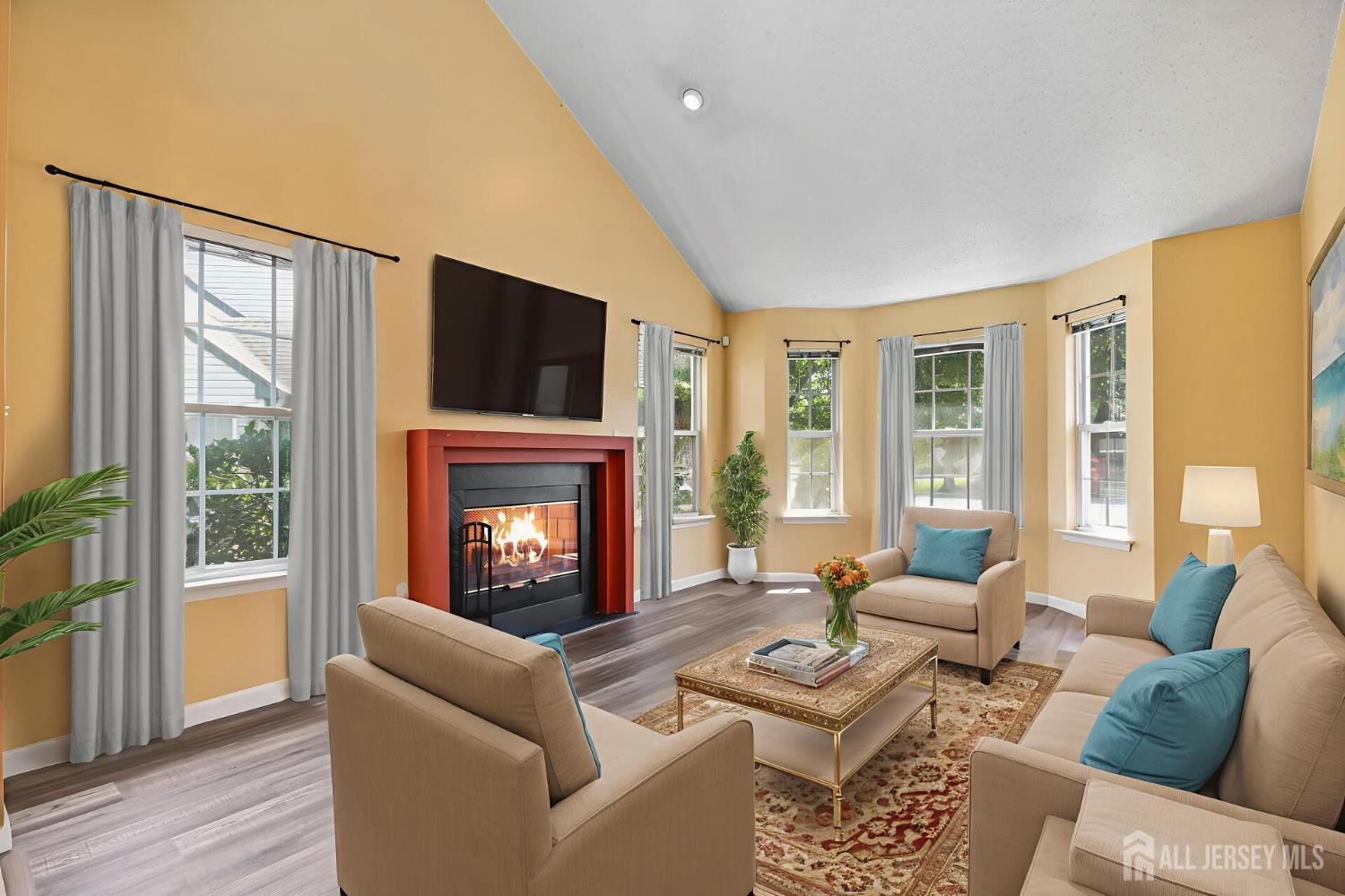 146 Nebula Road Piscataway, NJ 08854 - Photo 2 of 51 a living room with furniture a fireplace and a flat screen tv
