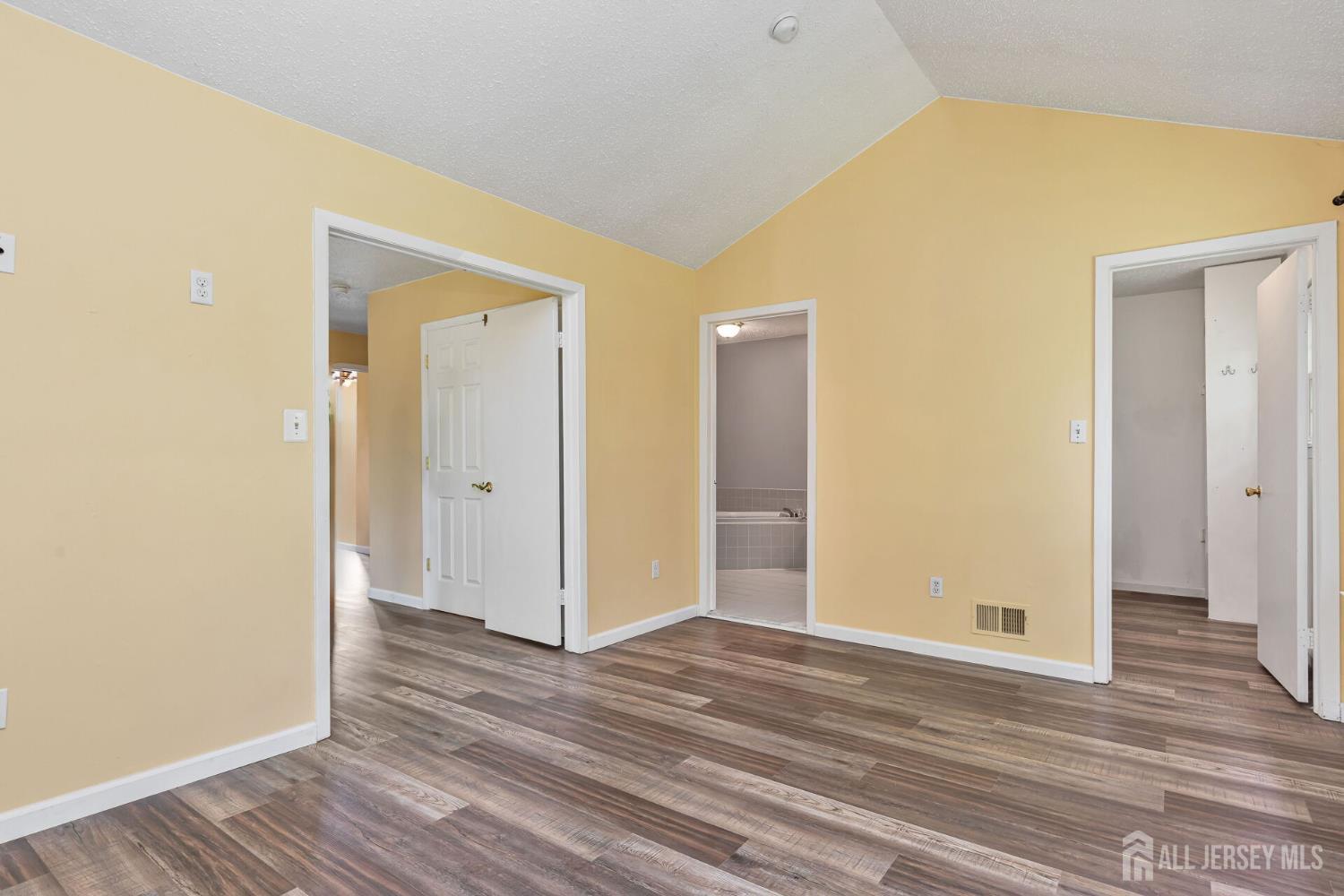 146 Nebula Road Piscataway, NJ 08854 - Photo 23 of 51 a view of a hallway with wooden floor