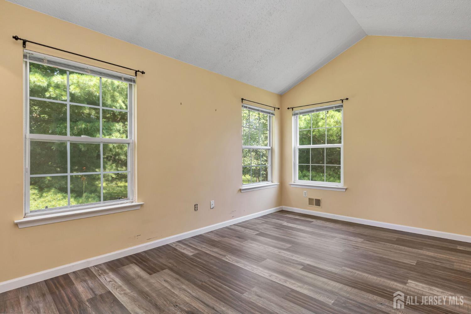 146 Nebula Road Piscataway, NJ 08854 - Photo 26 of 51 a view of empty room with wooden floor and fan