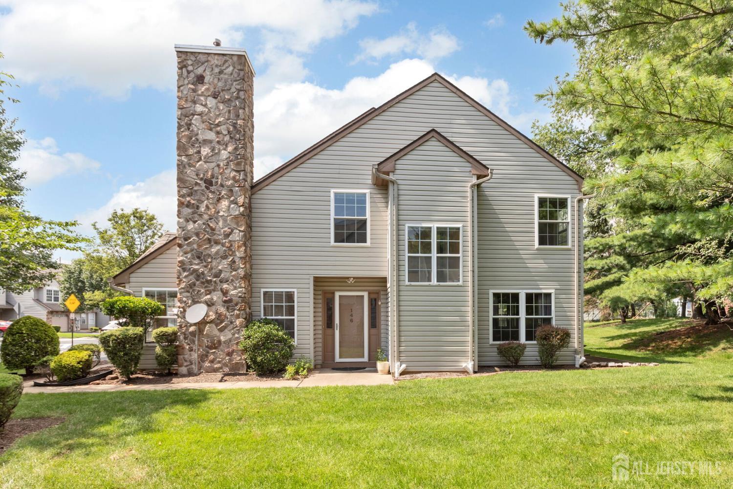 146 Nebula Road Piscataway, NJ 08854 - Photo 39 of 51 a front view of a house with a yard and garage