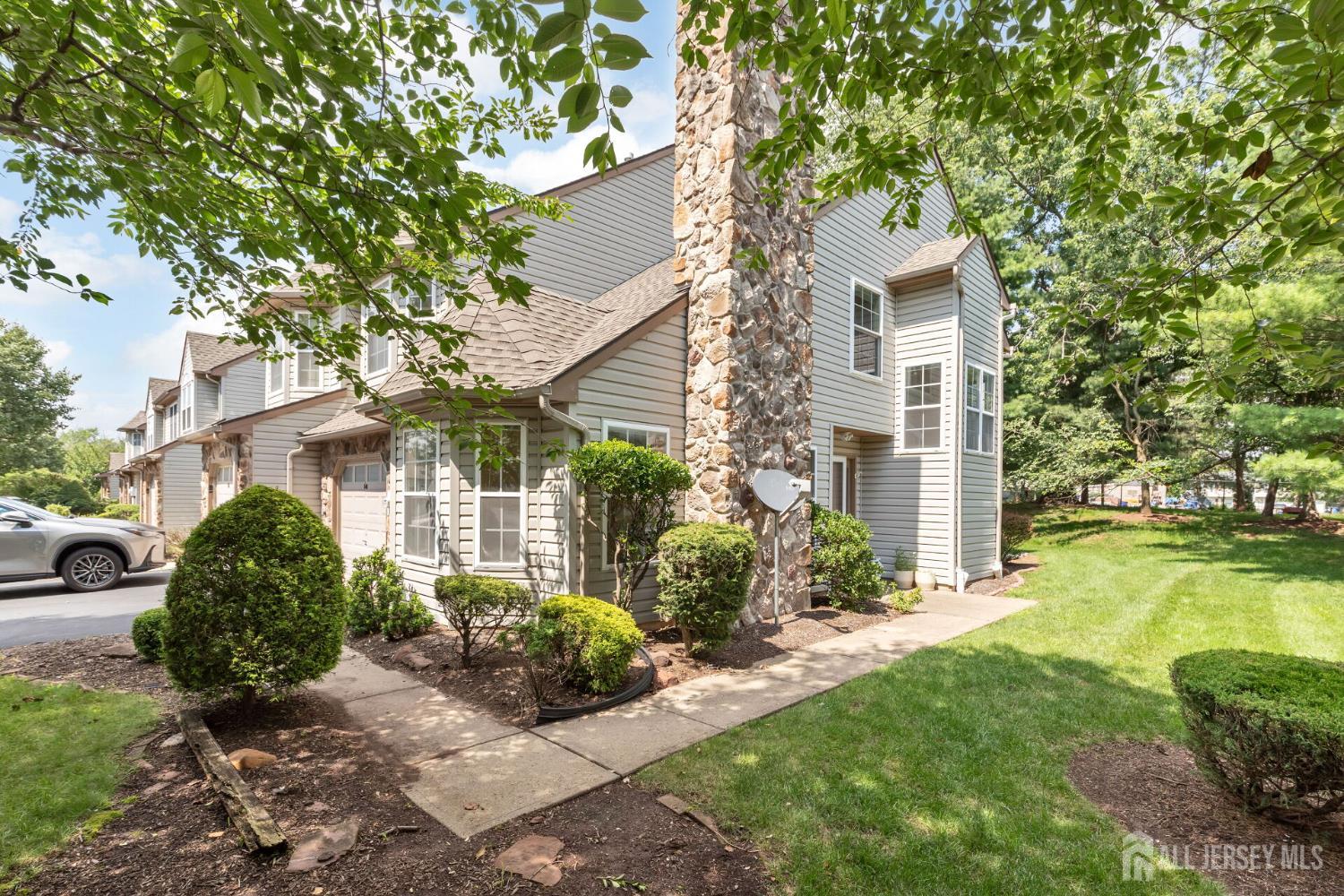 146 Nebula Road Piscataway, NJ 08854 - Photo 43 of 51 a front view of a house with garden