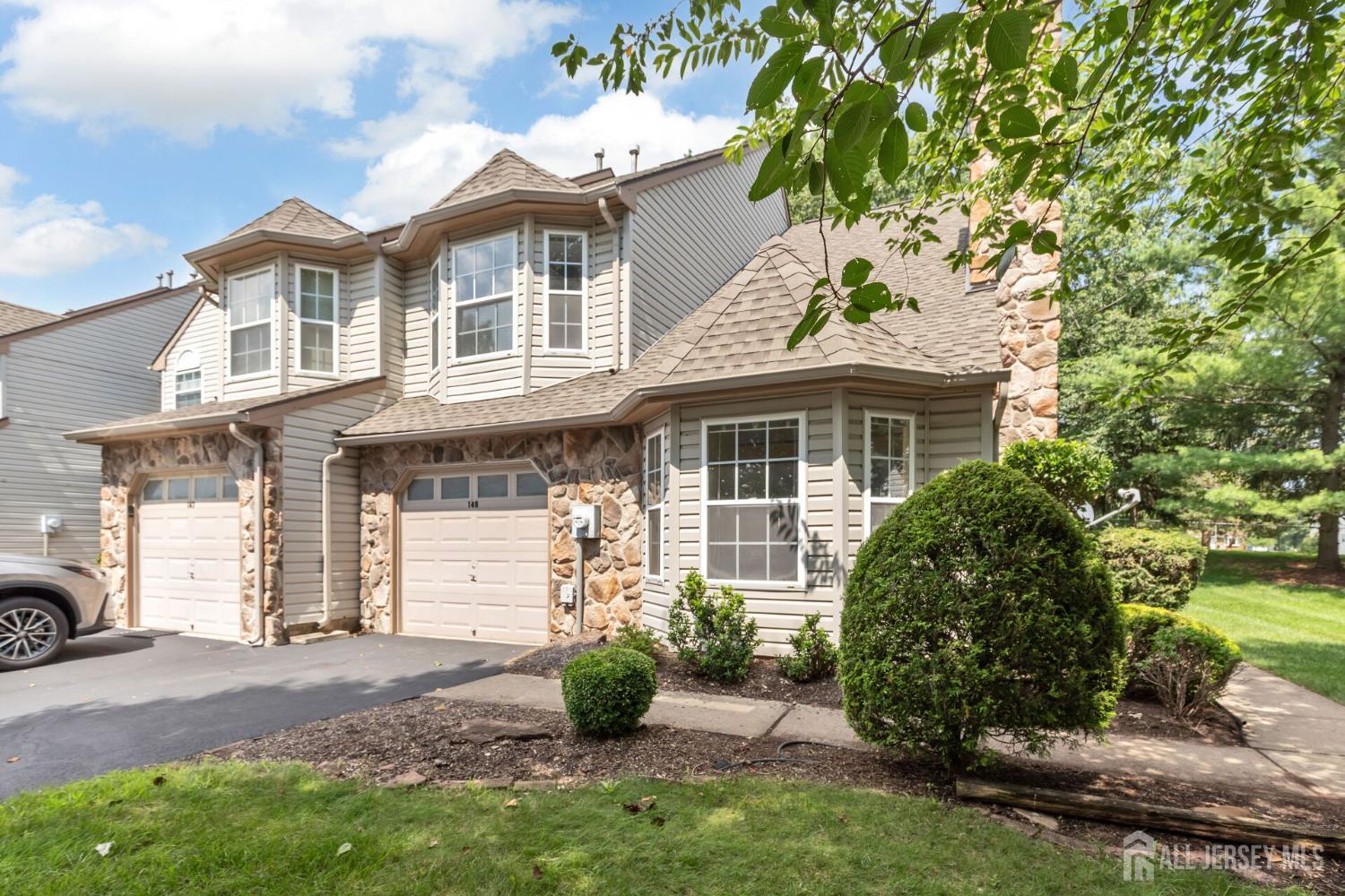146 Nebula Road Piscataway, NJ 08854 - Photo 44 of 51 a front view of a house with garden