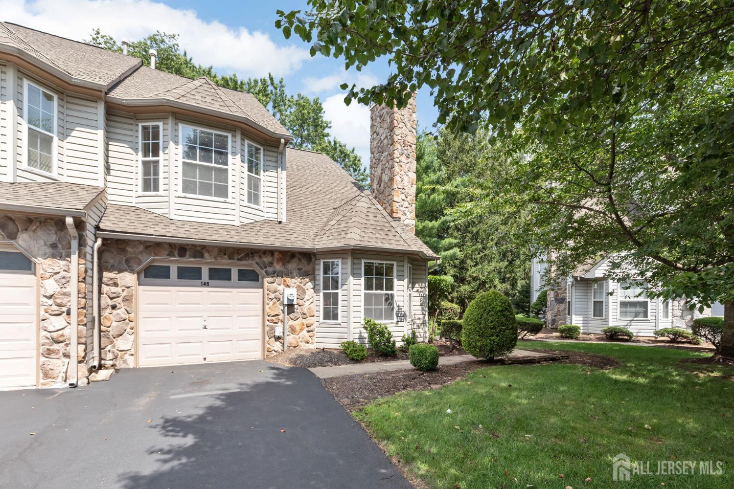 146 Nebula Road Piscataway, NJ 08854 - Photo 48 of 51 a front view of a house with a garden