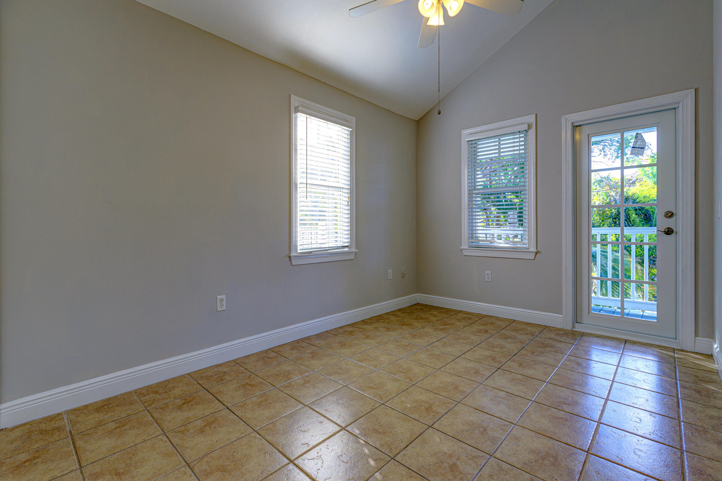 263 Golf Club Drive Key West, FL 33040 - Photo 23 of 30 an empty room with windows