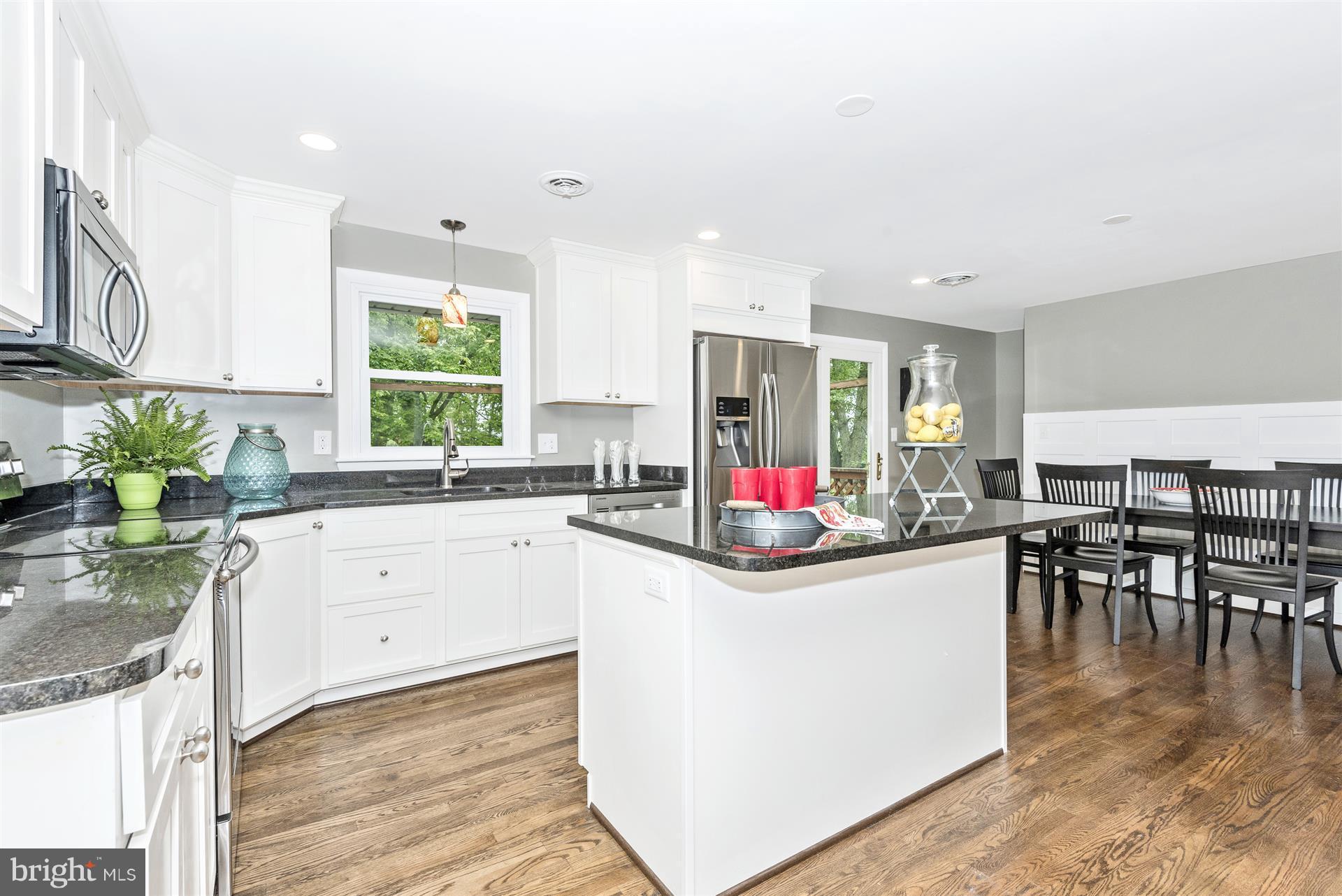14723 Harrisville Road Mount Airy, MD 21771 - Photo 11 of 29 a kitchen with a sink and cabinets