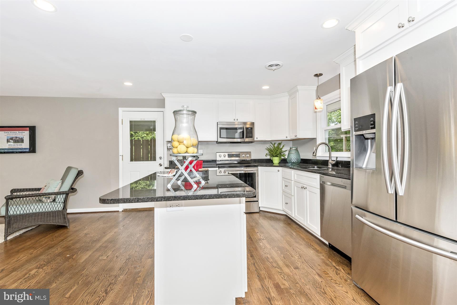 14723 Harrisville Road Mount Airy, MD 21771 - Photo 12 of 29 a kitchen with stainless steel appliances granite countertop a refrigerator stove top oven and sink