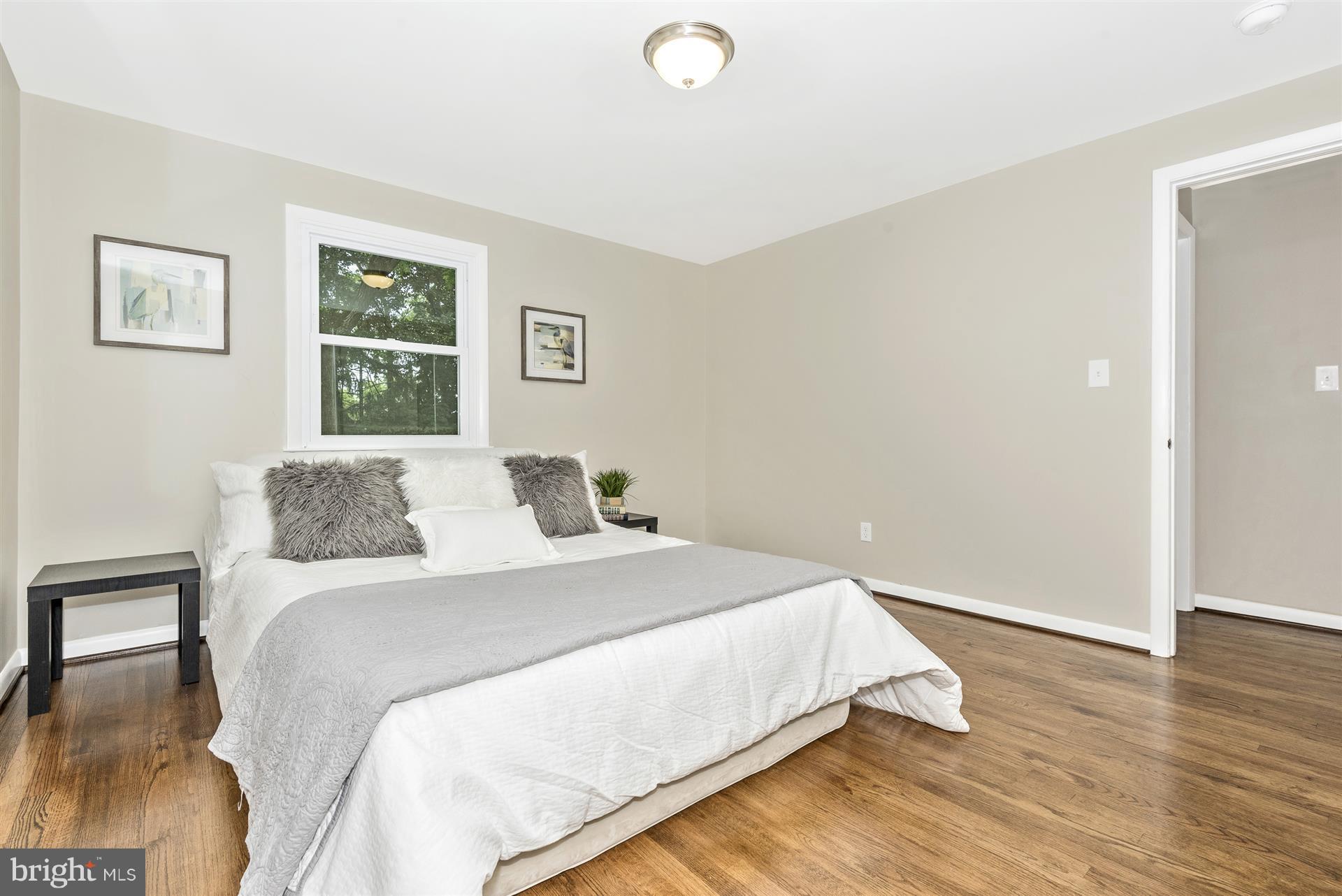 14723 Harrisville Road Mount Airy, MD 21771 - Photo 17 of 29 a bedroom with a bed and a window