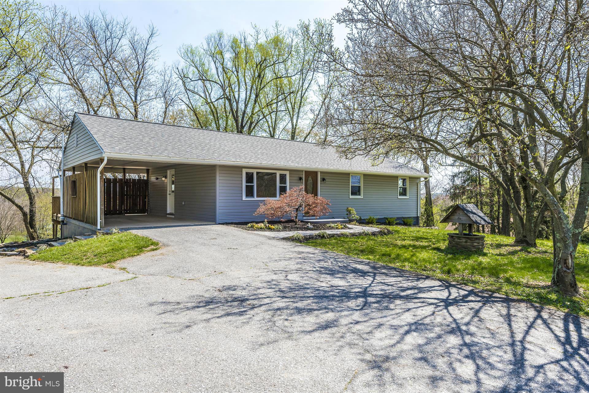 14723 Harrisville Road Mount Airy, MD 21771 - Photo 3 of 29 a view of a house with backyard and a tree