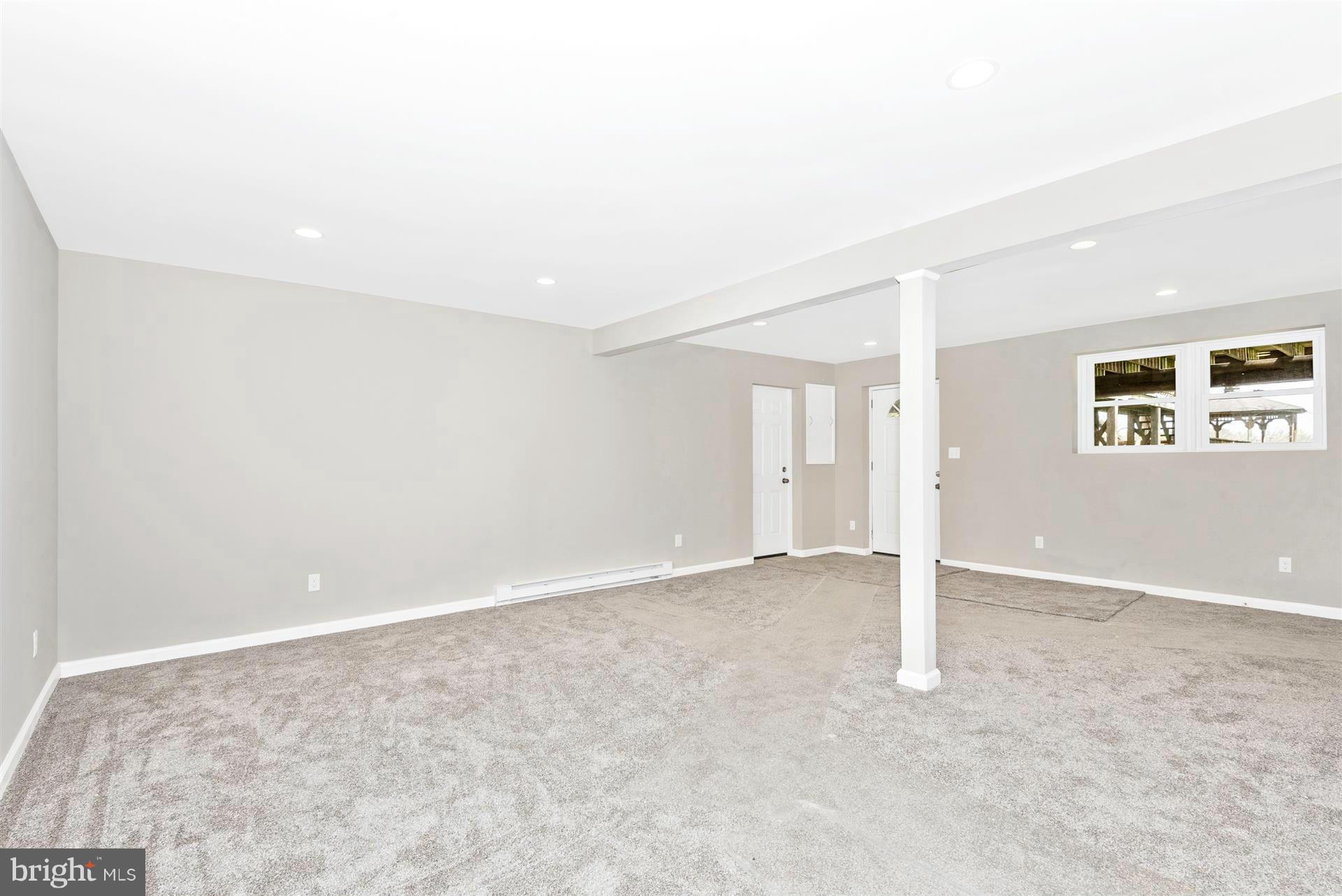 14723 Harrisville Road Mount Airy, MD 21771 - Photo 21 of 29 an empty room with closet and windows