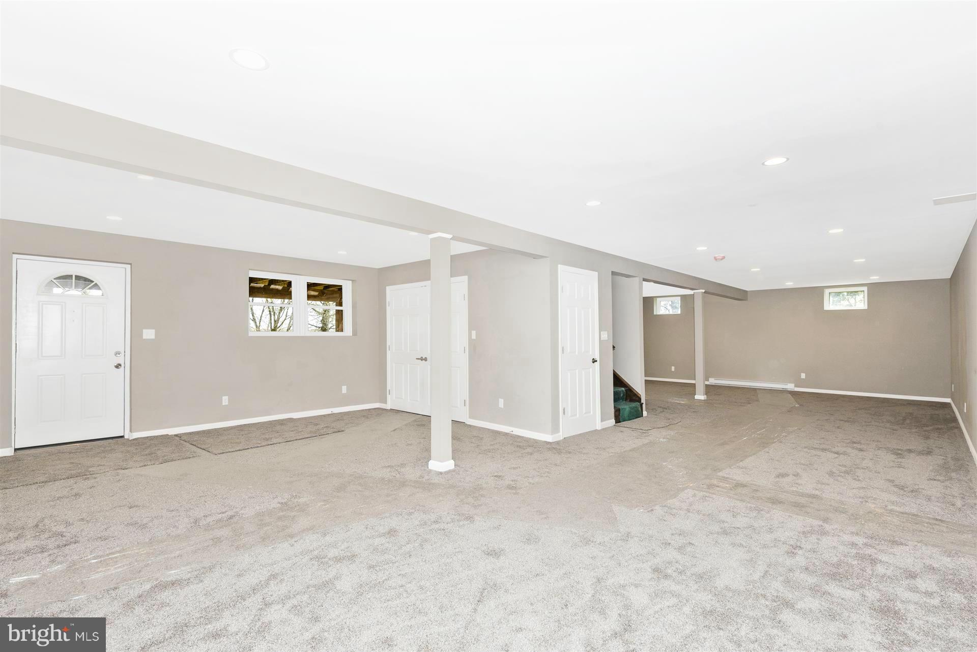 14723 Harrisville Road Mount Airy, MD 21771 - Photo 22 of 29 an empty room with a empty space and windows