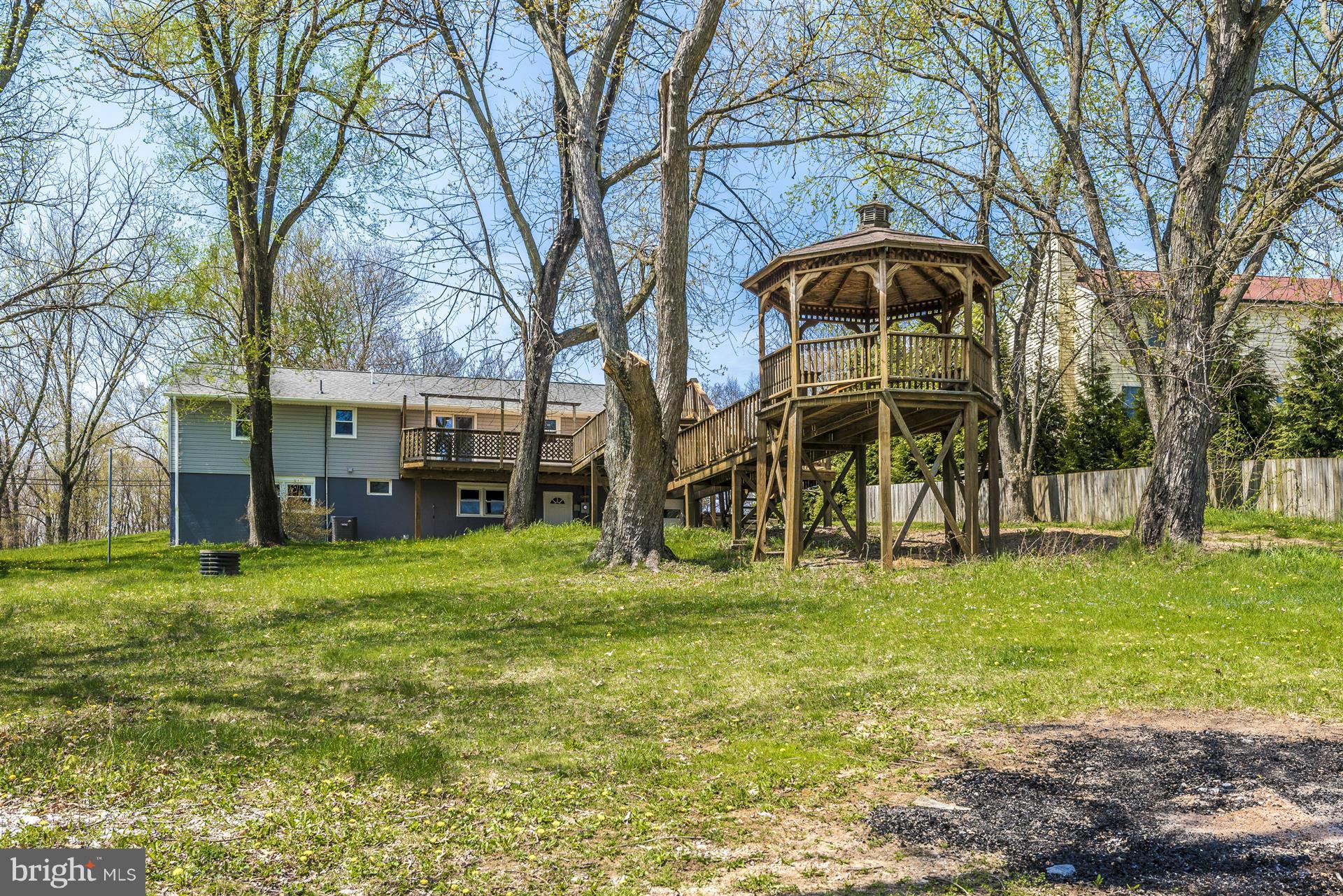 14723 Harrisville Road Mount Airy, MD 21771 - Photo 26 of 29 a view of a house with a yard