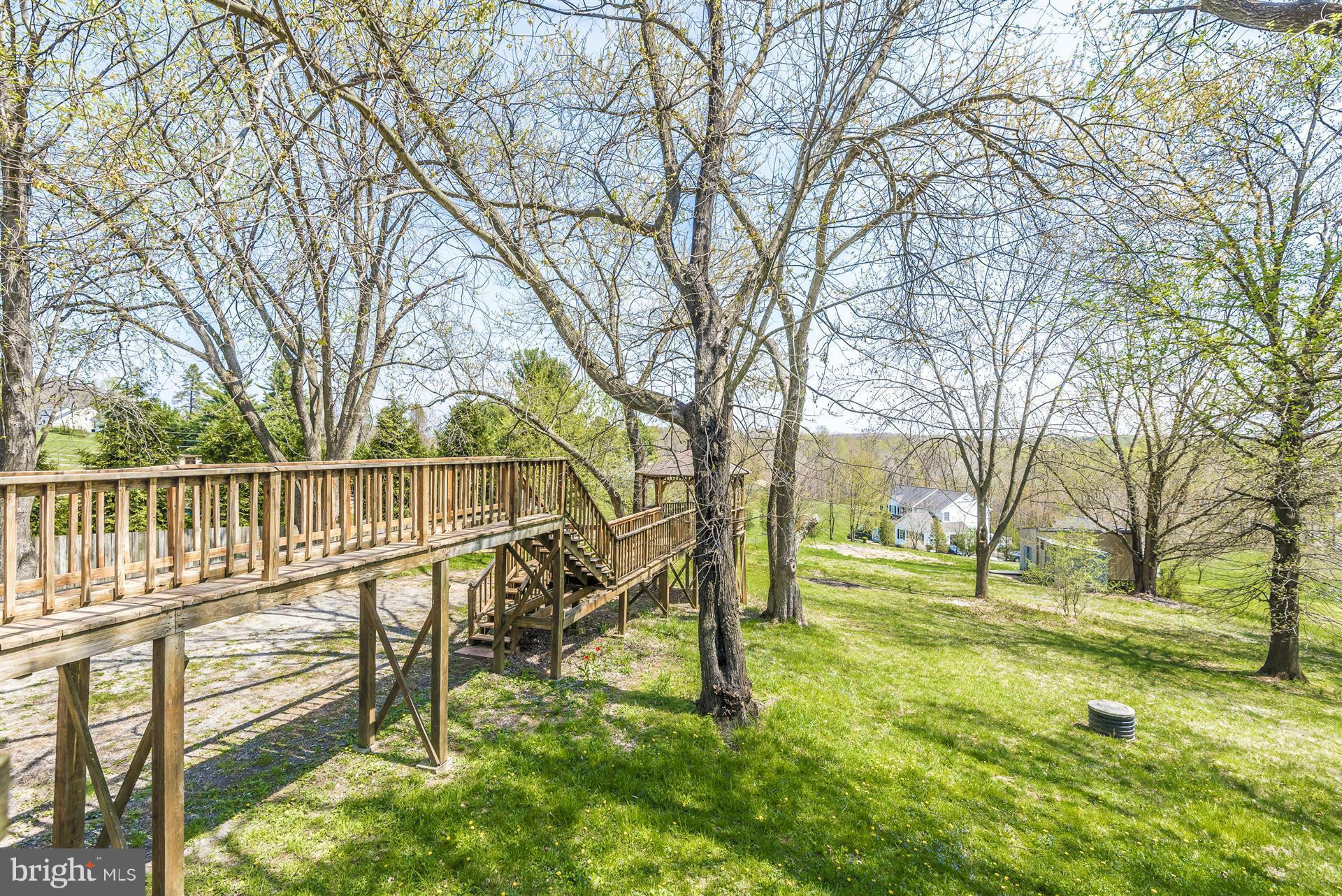 14723 Harrisville Road Mount Airy, MD 21771 - Photo 28 of 29 a view of a bench in a backyard of house