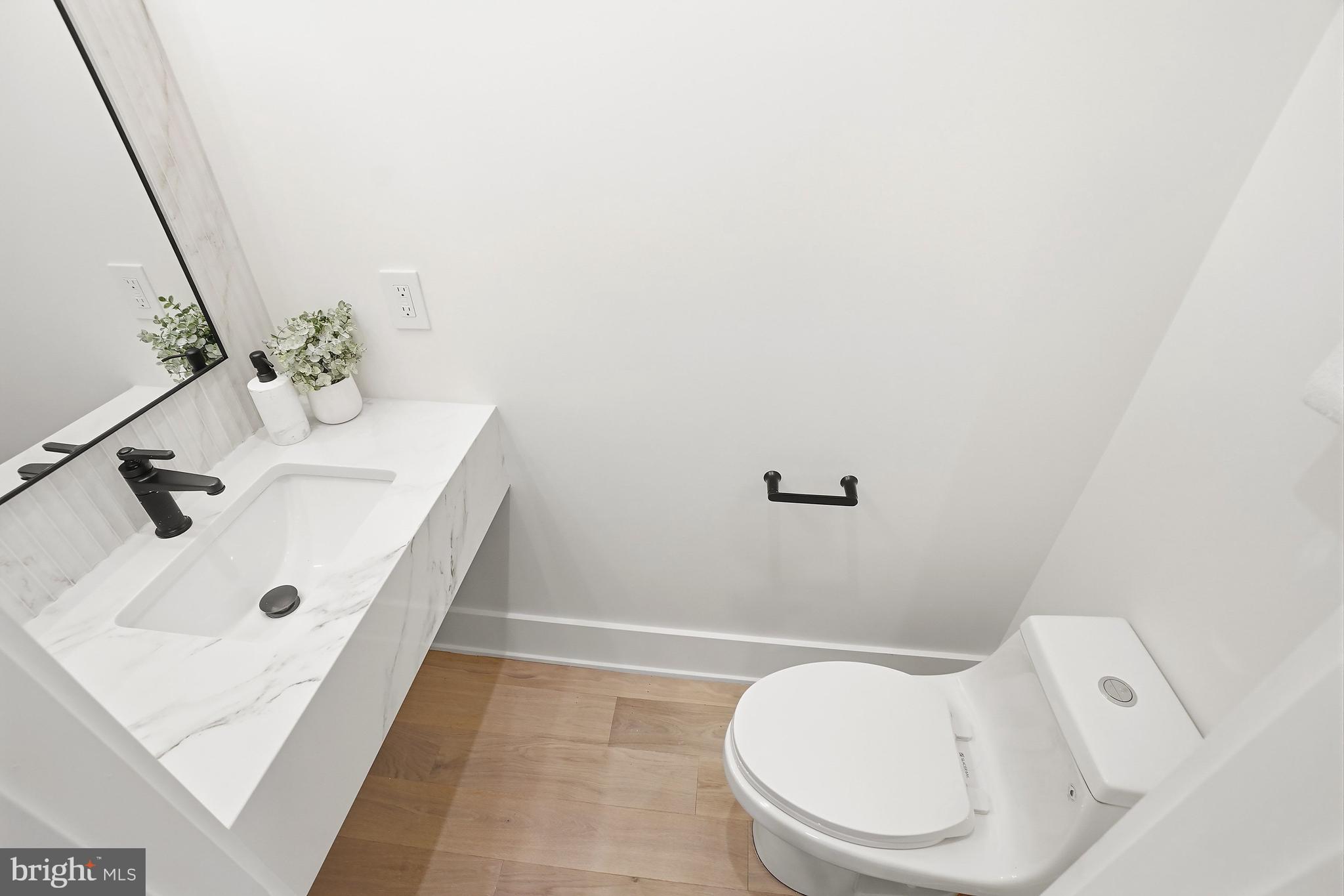 2026 37th Street Northwest Washington, DC 20007 - Photo 13 of 45 Main level half bath
