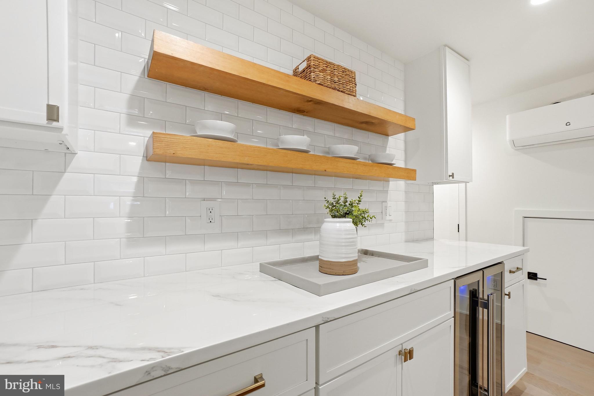 2026 37th Street Northwest Washington, DC 20007 - Photo 29 of 45 Bar with mini fridge for convenient entertaining