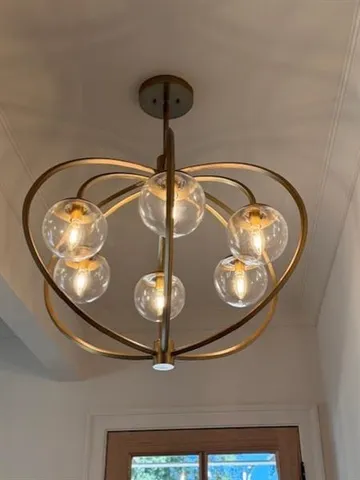 a bathroom with a granite countertop shower